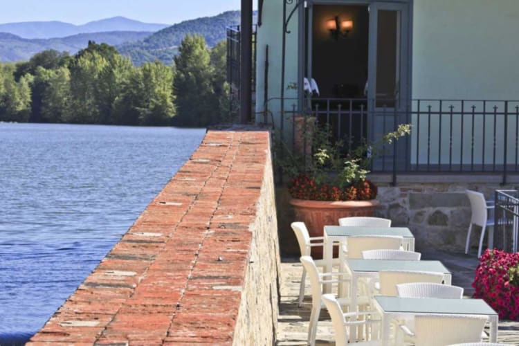 Tables by the river